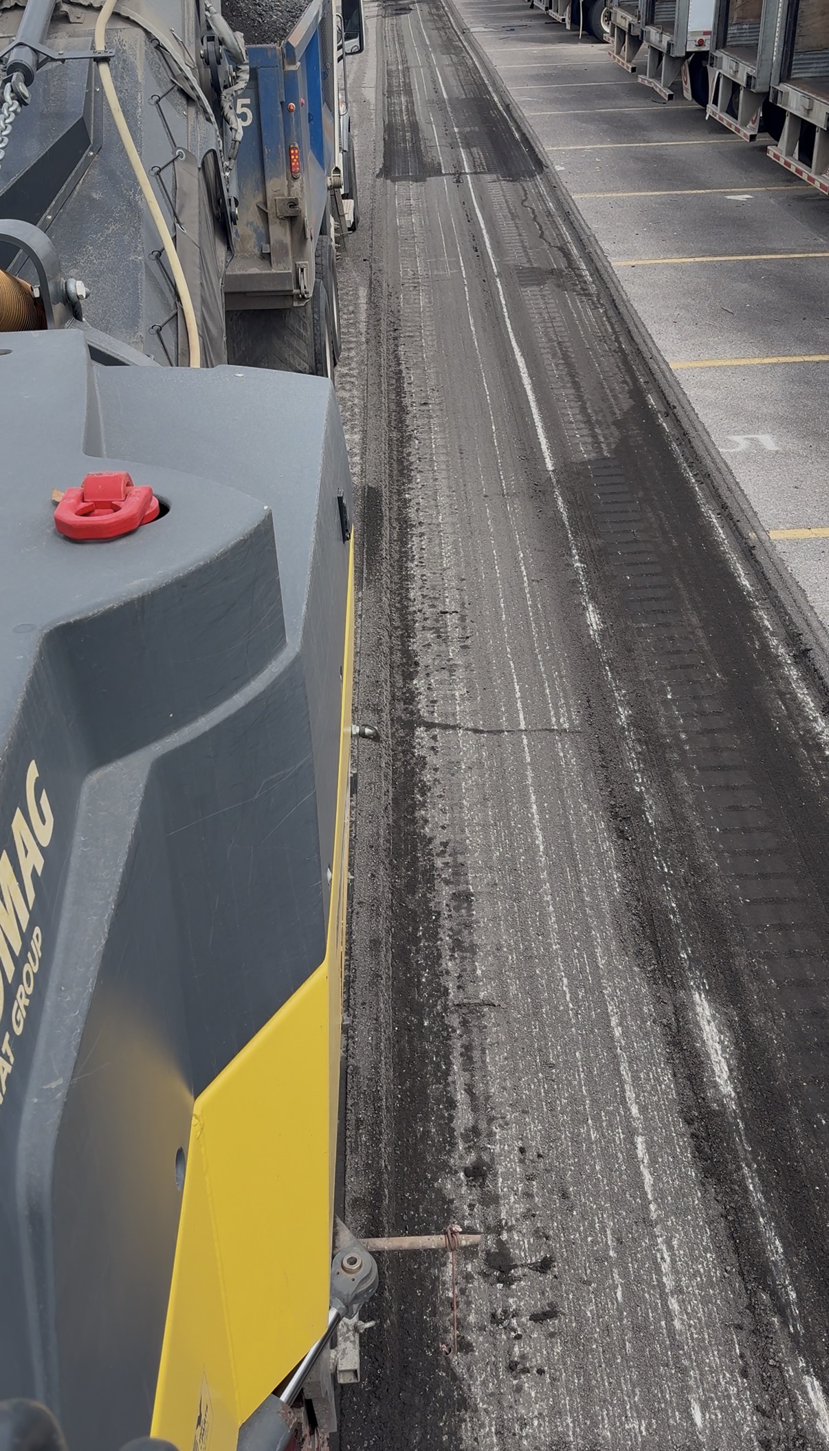 Milling machine working on pavement
